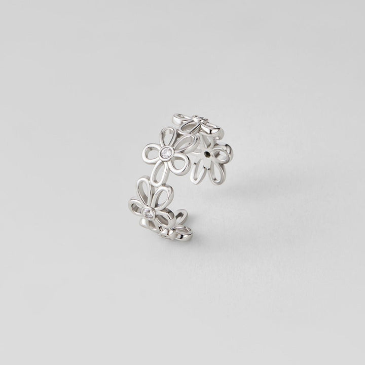 Anillo plateado infinito flores