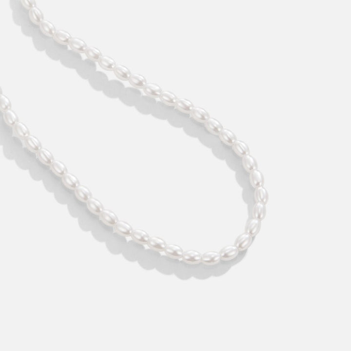 Collar de perlas oscuras