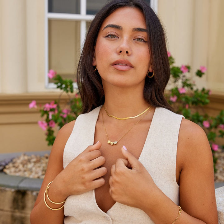 Collar triple con corazón
