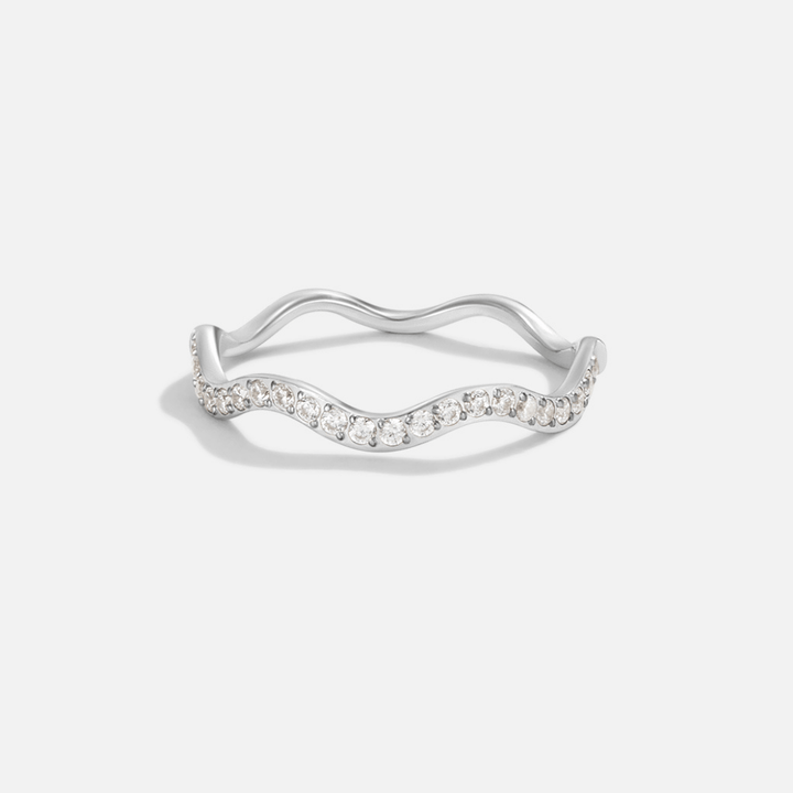 Anillo Zenya cristal y plateado ondulado